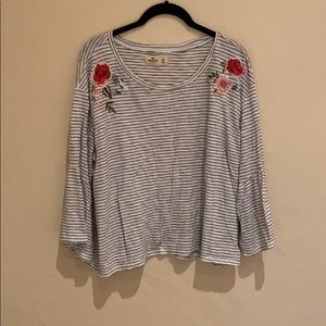 Black-white striped top with floral embroidery